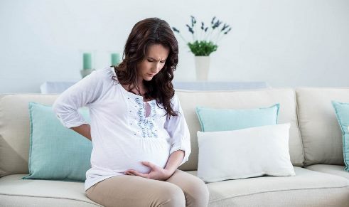 Болит копчик при беременности на ранних и поздних сроках причины